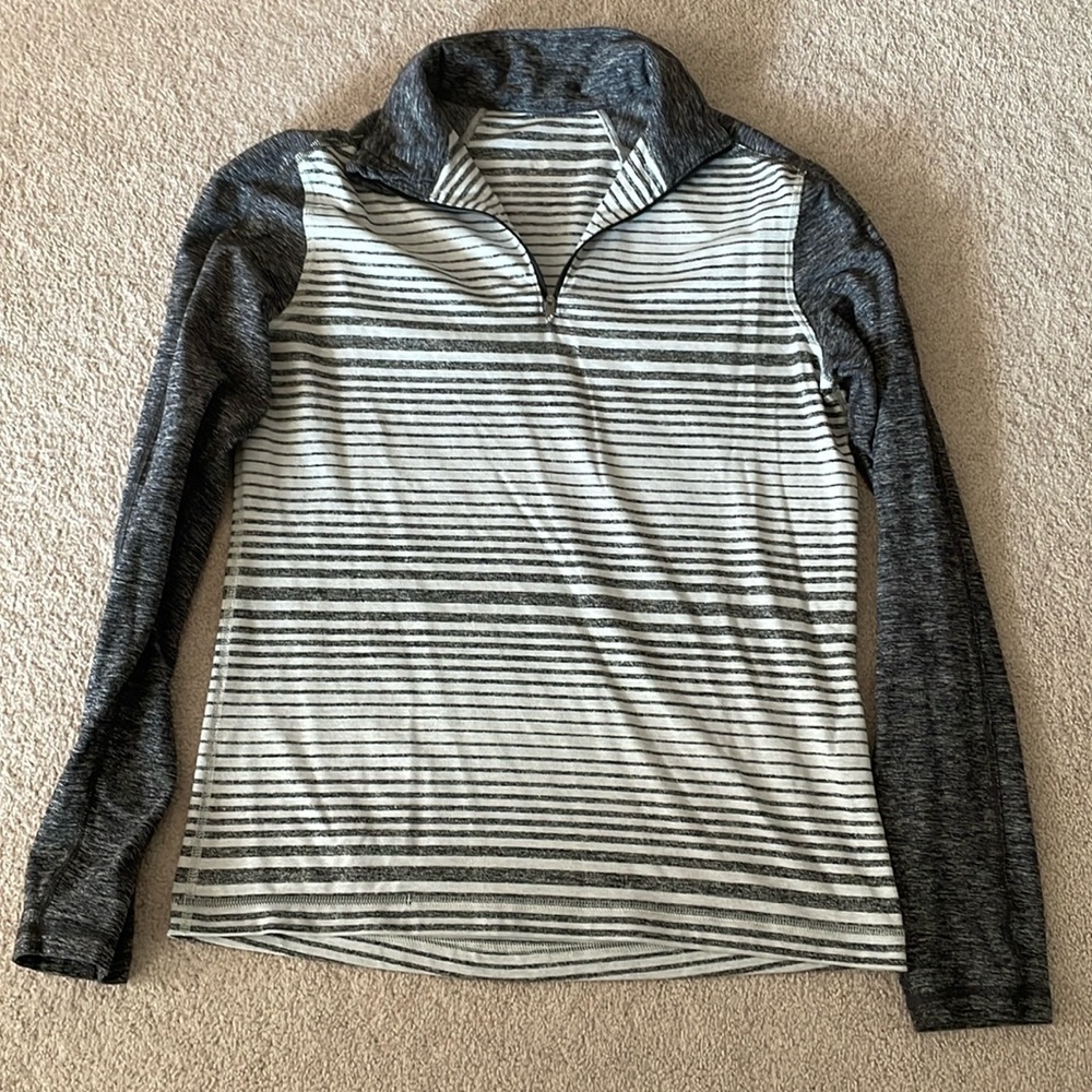 Unisex Lululemon half zip. Fits like a women’s size 10 or L